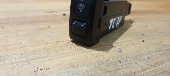 Panel lighting control switch