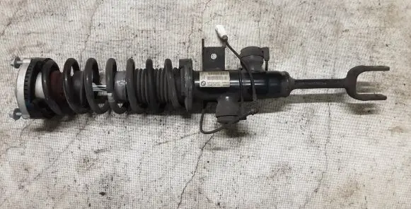 Front shock absorber with coil spring