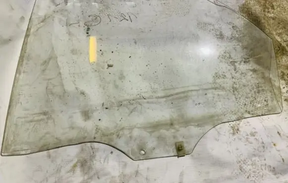 Mazda 121 Rear door window glass