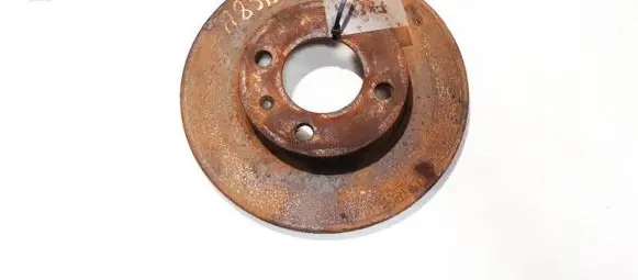 Volkswagen PASSAT B2 Front brake disc neventiliuojamas