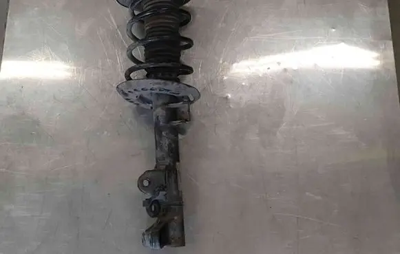 Mercedes-Benz E W212 Front shock absorber with coil spring A2123201138