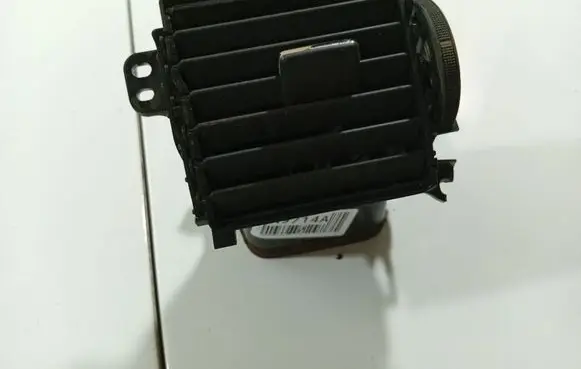 Dash center air vent grill