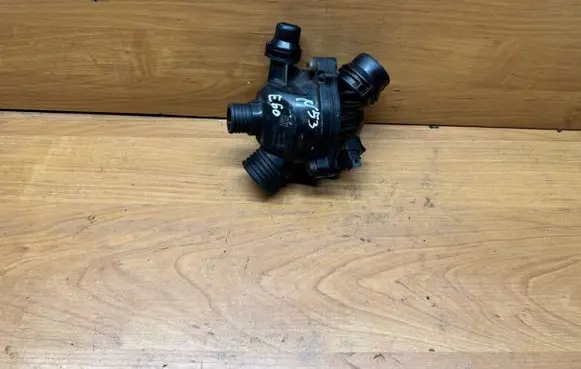 Thermostat/thermostat housing