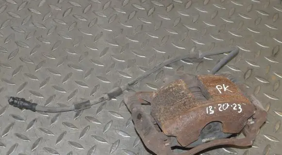 Volkswagen Golf VII Front brake caliper