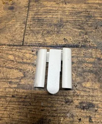 Front passenger seat rail trim