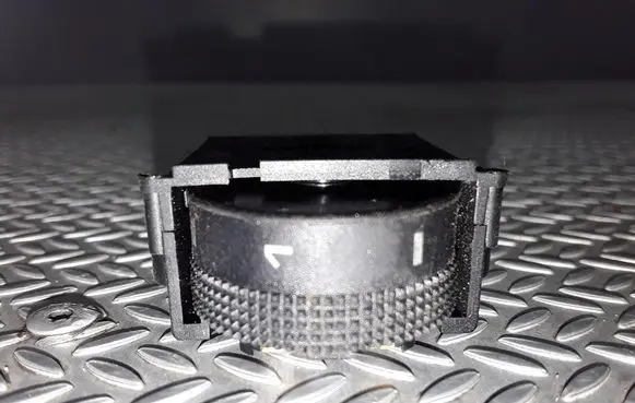 Headlight level height control switch