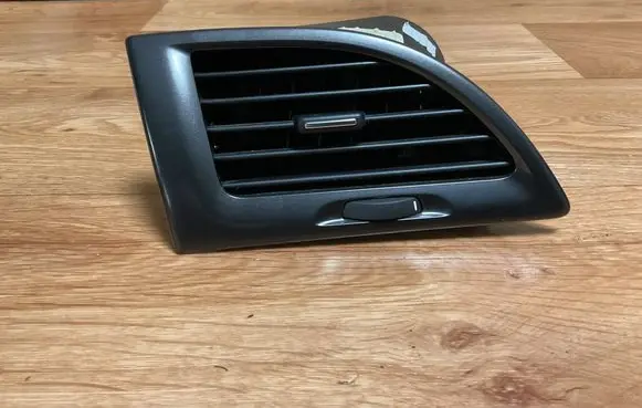 Dashboard side air vent grill/cover trim