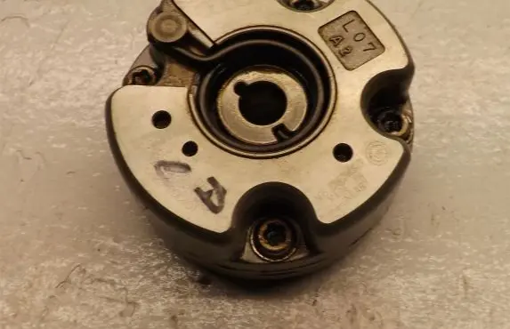 Audi A6 S6 C6 4F Camshaft pulley/ VANOS 06E109084G