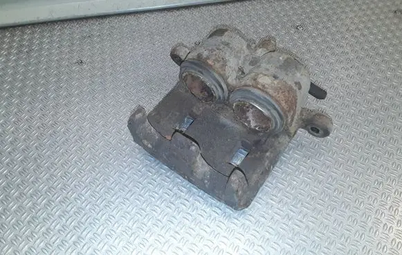 Subaru Impreza III Front brake caliper