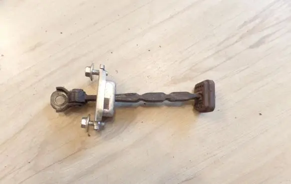 Honda FR-V Front door check strap stopper