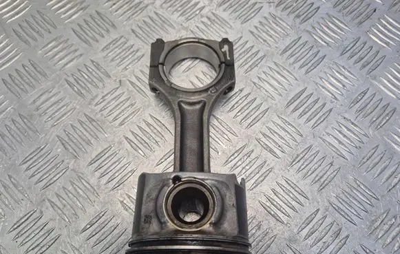 Piston with connecting rod