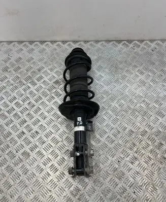 Toyota Yaris XP210 Front shock absorber with coil spring 48510K0070 03031000695