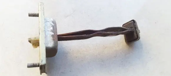 Mazda 626 Front door check strap stopper 