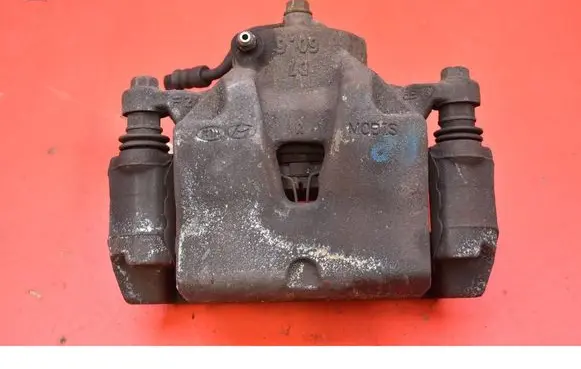 Hyundai Tucson JM Front brake caliper 