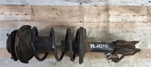 Front shock absorber with coil spring