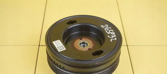 Opel Corsa E Timing belt tensioner pulley 55577791 26SP32