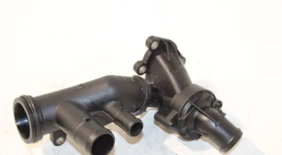 Thermostat/thermostat housing
