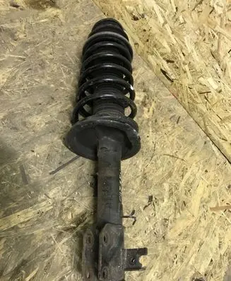 Suzuki SX4 Front shock absorber with coil spring