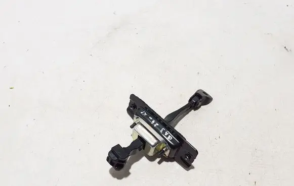 Front door check strap stopper
