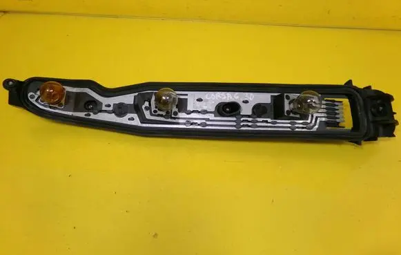 Opel Corsa C Tail light bulb cover holder