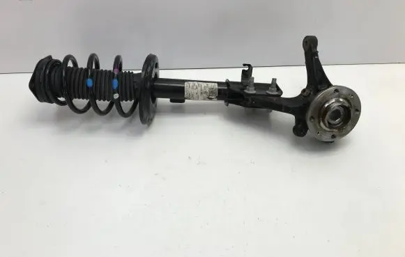 Front shock absorber with coil spring
