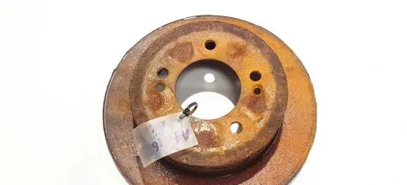 KIA Carens II Rear brake disc neventiliuojamas