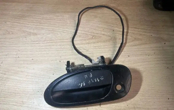 Mazda 323 Front door exterior handle