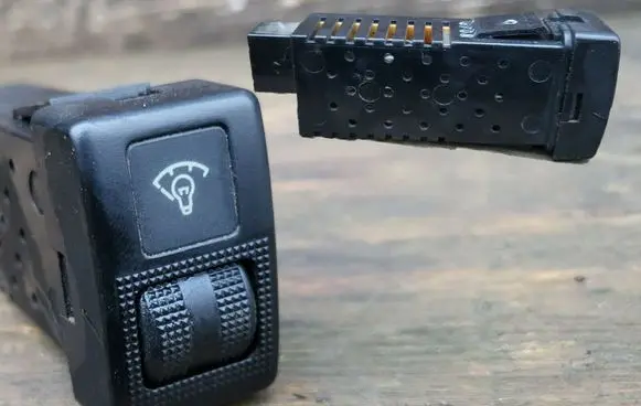 Panel lighting control switch