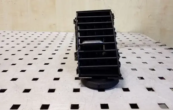 Dash center air vent grill
