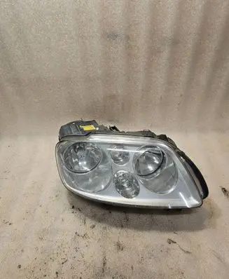 Volkswagen Touran I Headlight/headlamp 0301205204
