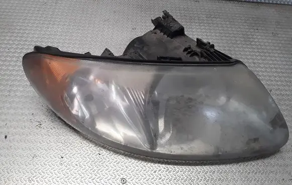 Chrysler Town & Country IV Headlight/headlamp 04857700AB
