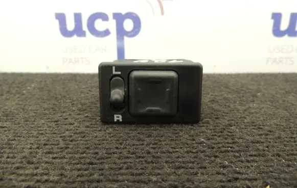 Nissan Primera Wing mirror switch D129