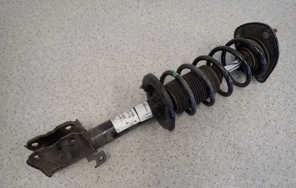 Mitsubishi Colt Front shock absorber with coil spring 