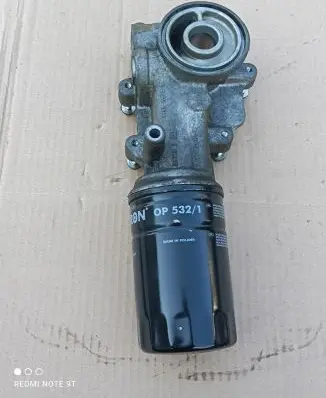 Mazda CX-9 Oil filter mounting bracket 7T4E-6884-EE
