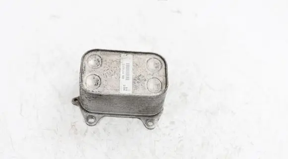 Volkswagen Golf VI Engine oil radiator 03L117021C