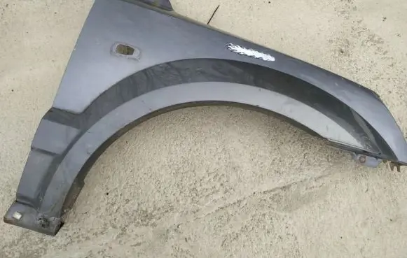 KIA Sorento Fender pilkas