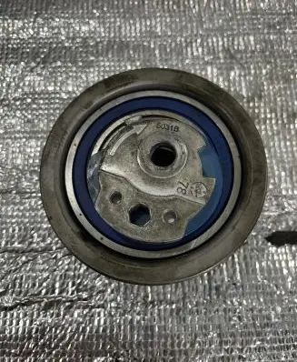 Volkswagen Caddy Belt tensioner pulley 979901