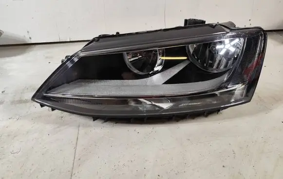 Volkswagen Jetta VI Headlight/headlamp 083411129L