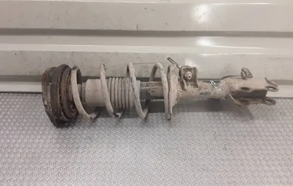 Nissan Tiida C11 Front shock absorber with coil spring 