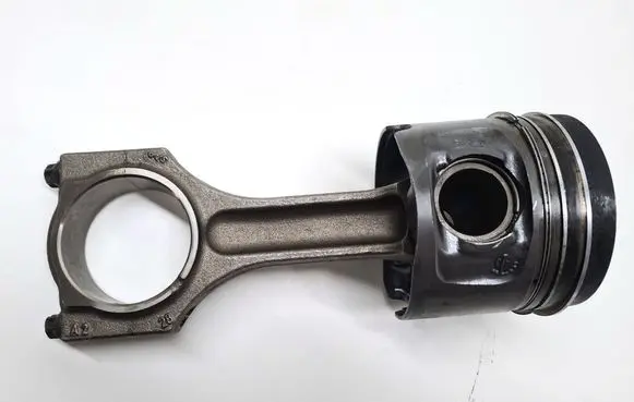 Piston with connecting rod