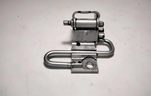 Front door lower hinge
