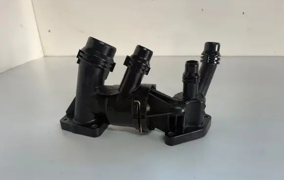 Thermostat/thermostat housing