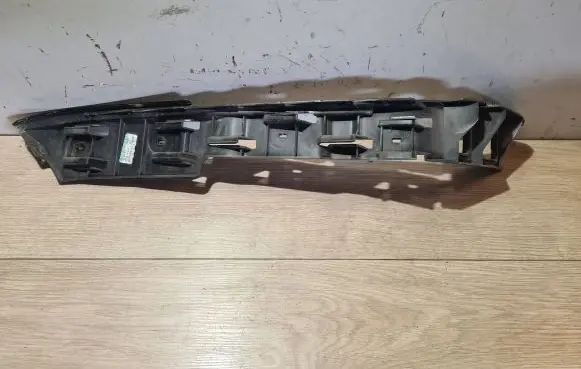 Volkswagen Golf VI Bumper support mounting bracket corner 1K9807393
