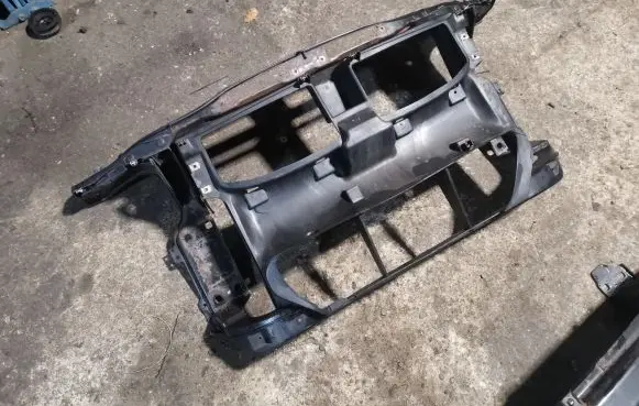 Radiator support slam panel