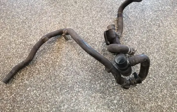 Volkswagen Transporter - Caravelle T5 Engine coolant pipe/hose 03L121131K