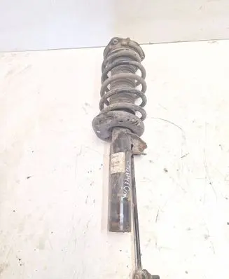 Volkswagen Caddy Front shock absorber with coil spring
