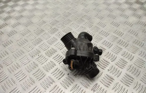 Thermostat/thermostat housing