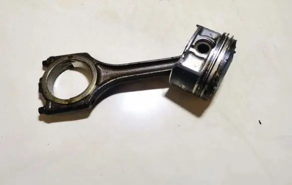 Piston with connecting rod