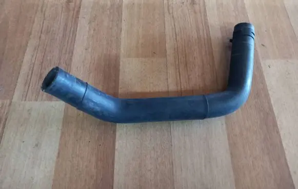 Volkswagen PASSAT B6 Engine coolant pipe/hose 1K0121157BJ