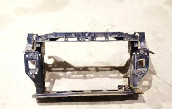 Radiator support slam panel